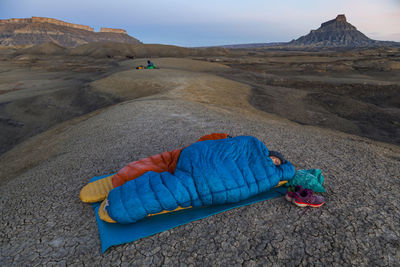 People camp in factory butte badlands, utah