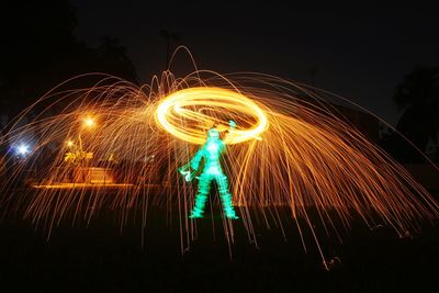 Light painting of firework display at night