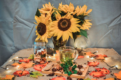 Close-up of sunflowers in vase on table