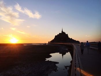 Scenic view of sea at sunset