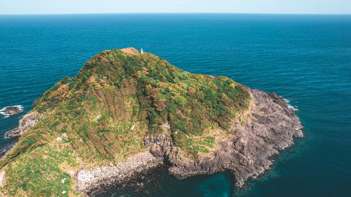 Scenic view of sea against clear sky