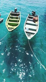 High angle view of nautical vessels moored on sea