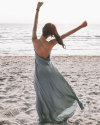 Rear view of a man on beach