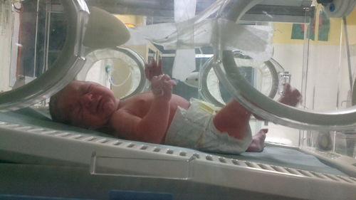 Close-up of man lying on floor