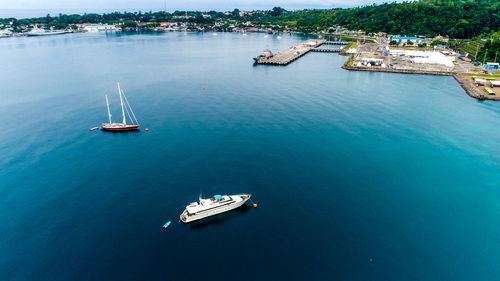 High angle view of sailboat sailing on sea