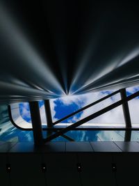 Low angle view of ceiling against blue sky