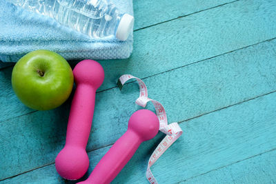 Close-up of exercise equipment on blue table