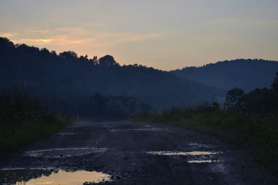 Scenic view of landscape against sky during sunset