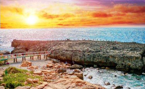 Scenic view of sea against sky during sunset