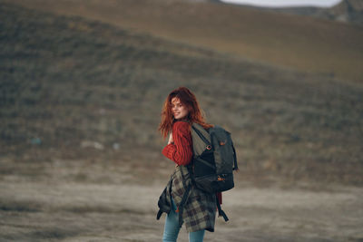 Full length of woman standing outdoors