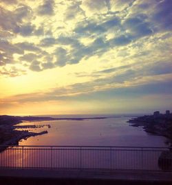 Scenic view of sea at sunset