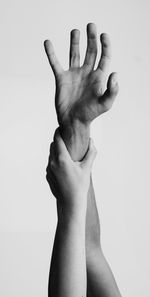 Midsection of man against white background