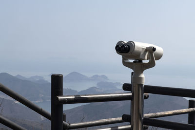 Close-up of binoculars against clear sky