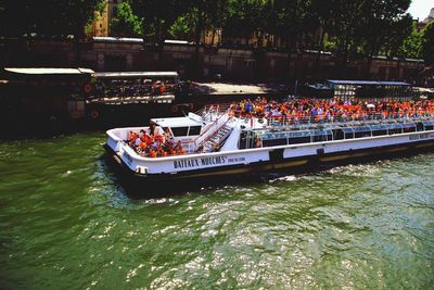 People on boat in river