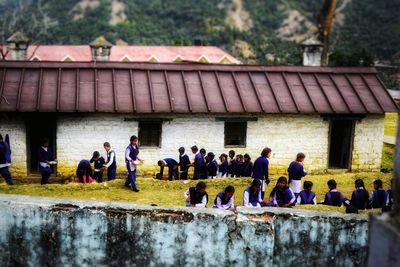 Group of people in front of building