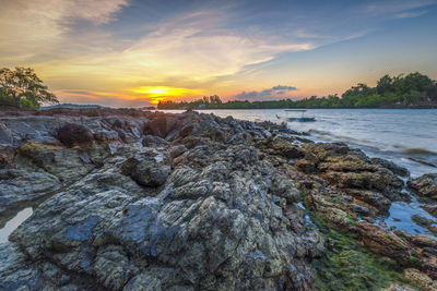 Scenic view of sea against sky during sunset