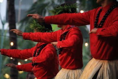 Men performing hula hula