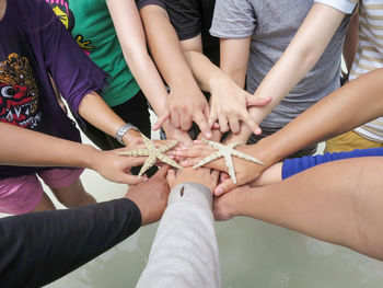 Low section of people against bare feet