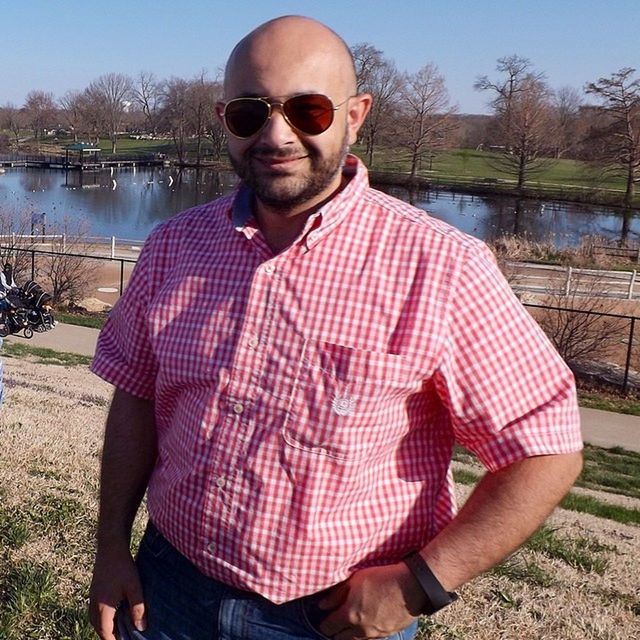 lifestyles, leisure activity, person, casual clothing, water, sunglasses, young adult, looking at camera, front view, lake, portrait, three quarter length, childhood, sitting, sky, standing, smiling, waist up