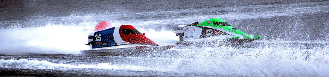 Man splashing water in sea