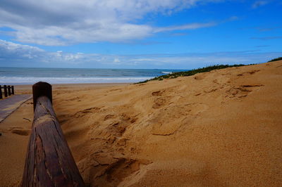 Scenic view of beach against sky