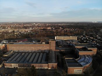 High angle view of buildings in city against sky