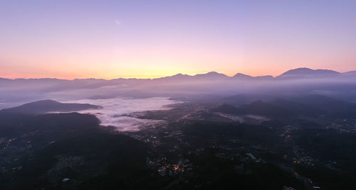 Scenic view of mountains against sky during sunset