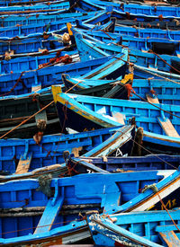 Boats moored at harbor