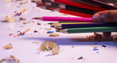 Close-up of colored pencils on table