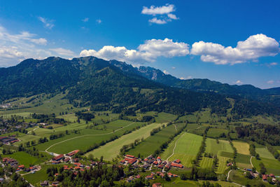 Scenic view of landscape and mountains against sky