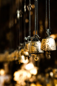 Close-up of bells at market stall