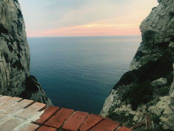 Scenic view of sea against sky at sunset