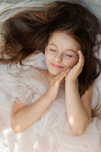 Portrait of a woman lying down