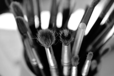 Close-up of paintbrushes on table