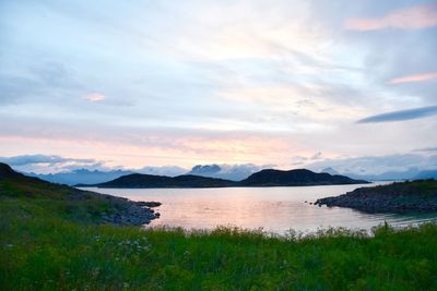 Scenic view of lake against sky during sunset