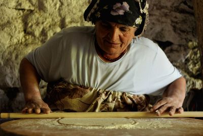 Portrait of man working on table