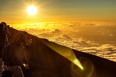 Scenic view of mountains against sky during sunset