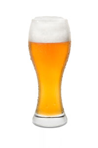 Close-up of beer glass against white background