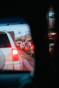 Cars on road in city at night