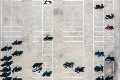 High angle view of people walking on footpath