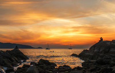 Scenic view of sea against sky during sunset