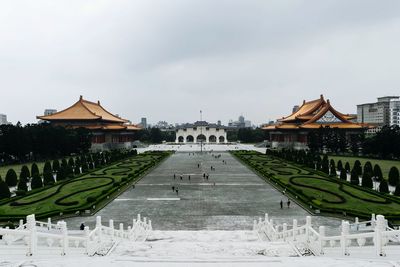 Panoramic view of buildings in city against sky