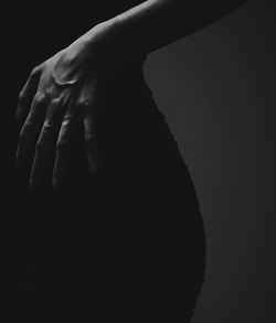 Close-up of lamp over black background