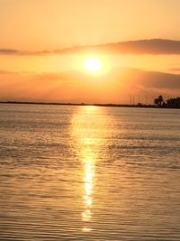 View of calm sea at sunset