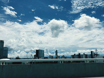 Buildings in city against sky