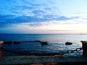 Scenic view of sea at sunset