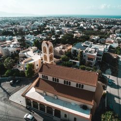 Aerial view of townscape against sky