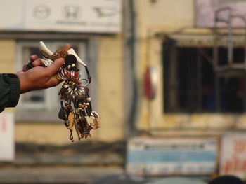 Midsection of person holding food