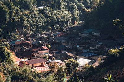 High angle view of townscape and trees in city