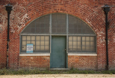 Close-up of window on brick wall